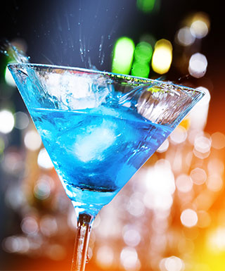 blue drink with colorful background