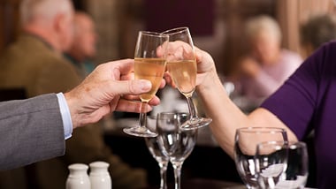 clinking champagne glasses