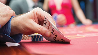 A player checks their hand.